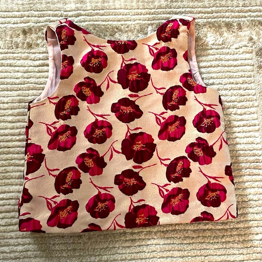 Rose blouse buttons to the back